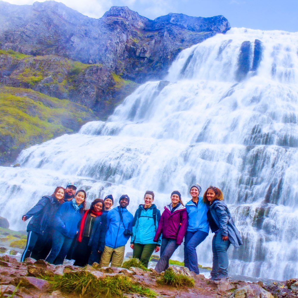 SIT students in front of a waterfall in Iceland